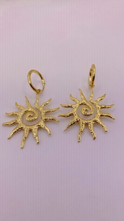 Ο ΗΛΙΟΣ ΤΟΥ ΦΩΤΟΣ: Η Ακτίνα που Έγινε Κόσμημα